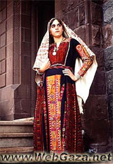 Black Beit Dajan Dress - Dress from Dajan dress, Jaffa area, with a rare embroidered scarf, District of Jaffa.